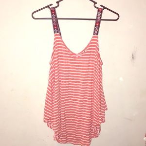 A coral and white horizontal striped tank